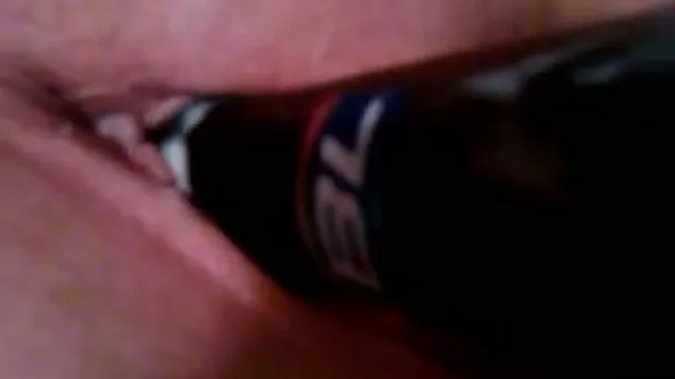 Anonymous voracious bitch pokes her twat with glass bottle