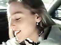 My beautiful smiling blondie gives me a head in the car