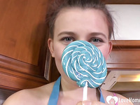 Hot MILF enjoys sucking on a lollipop