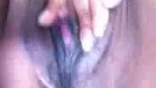 Whorish ebony chick demonstrates her soaking twat on webcam