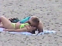 Filming a horny man on the beach trying to seduce his bootyful girlfriend