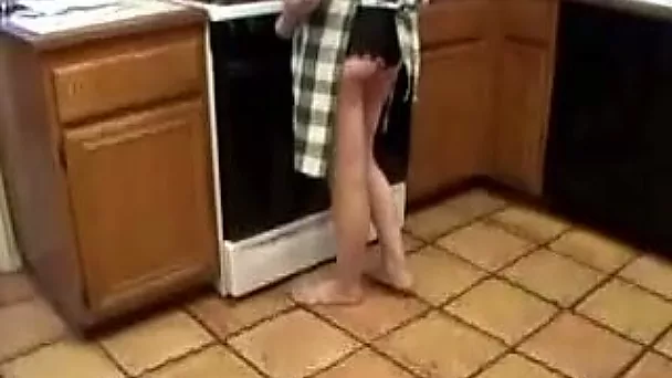 Bosomy fair haired wifey masturbates greedily at kitchen counter