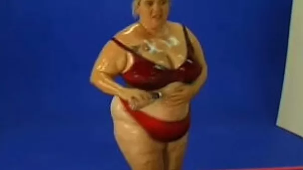 Playing and wrestling with a blonde BBW on the mat