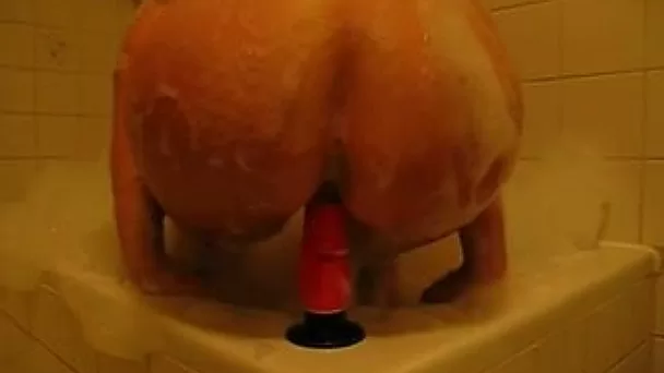 Filming my sexy wife with hot booty riding a dildo in the bathroom
