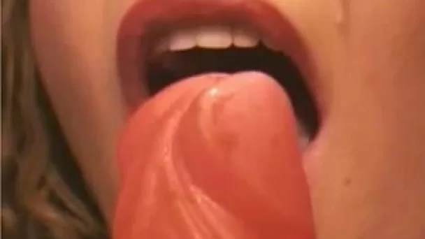 Curly brown-haired whore sucks dildo for me on webcam