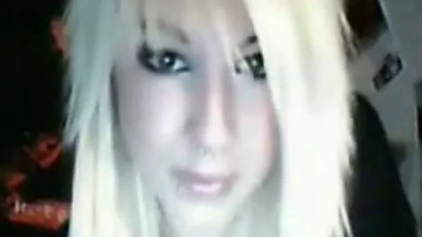 Fuckable blonde bitch pleases her pink pussy on webcam
