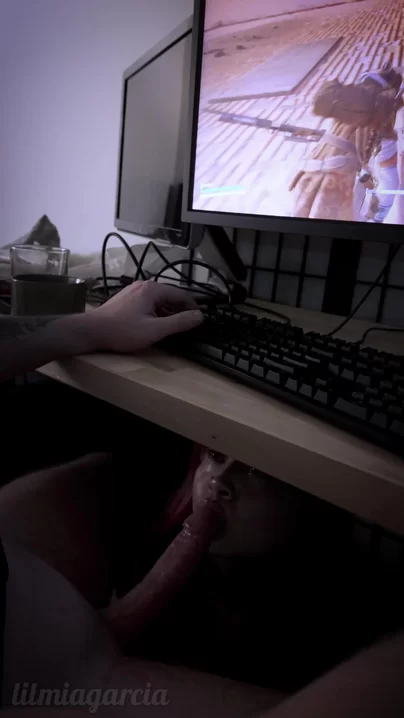 Blowing her step-brother while he plays his game